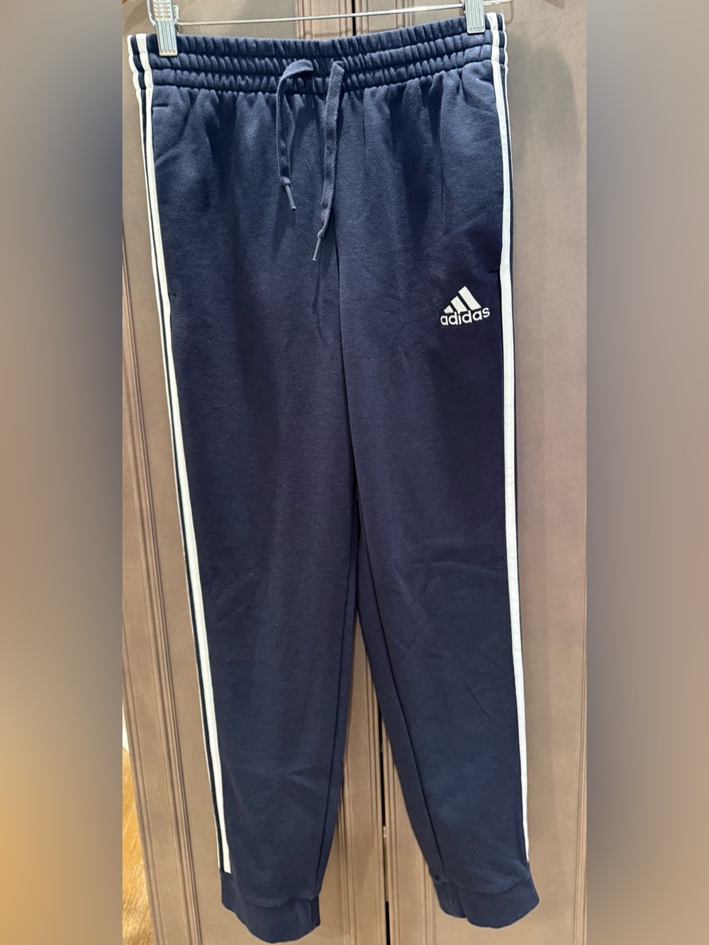 adidas small navy blue joggers with classic adidas white stripes and logo